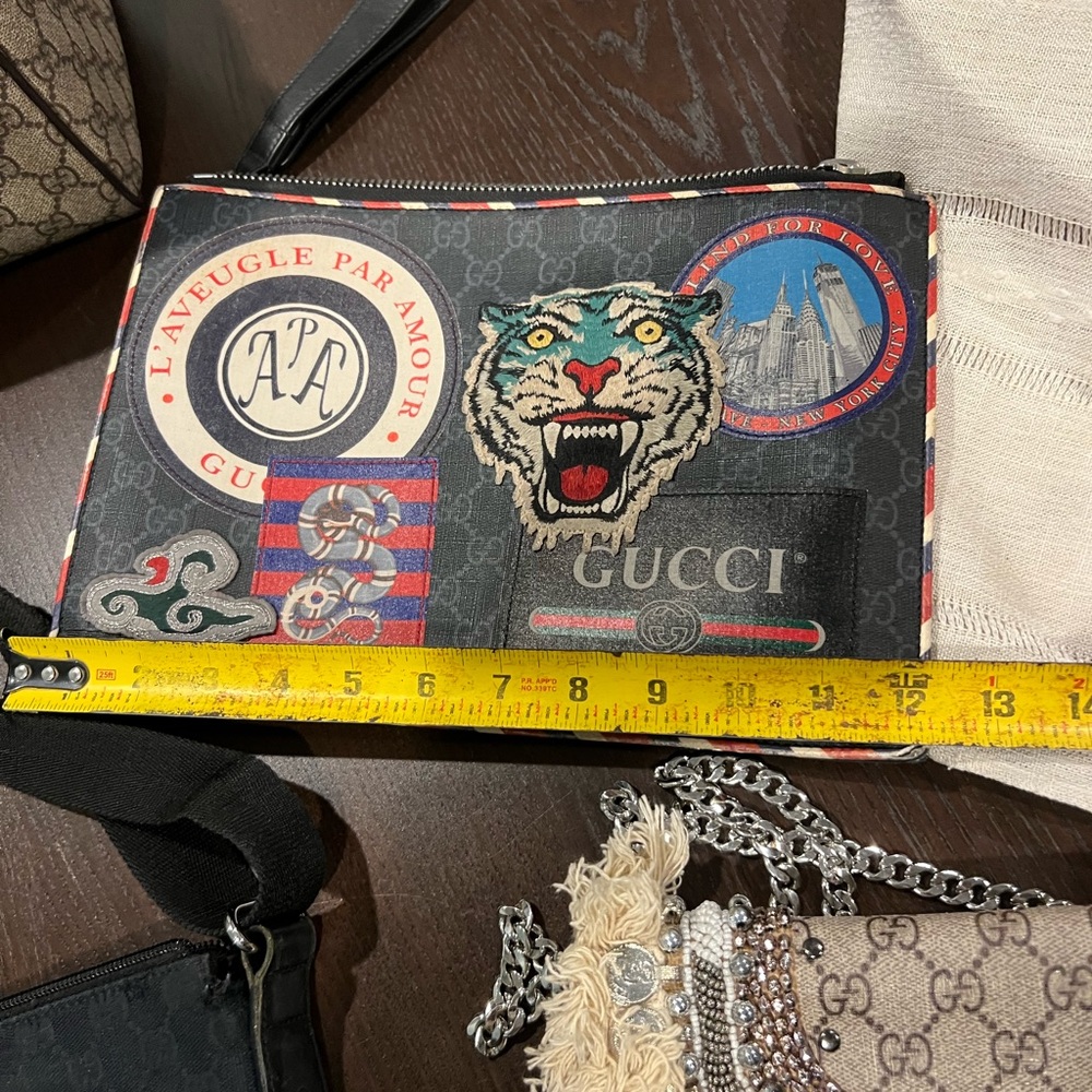 Used twice Gucci oversized clutch/with wrist strap. Patchwork - Picture 2 of 4